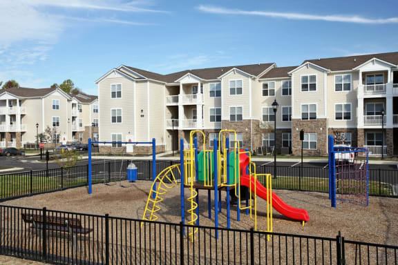 a playground at the flats at big tex apartments in san antonio, txat Addison Crater Woods, Virginia, 23805