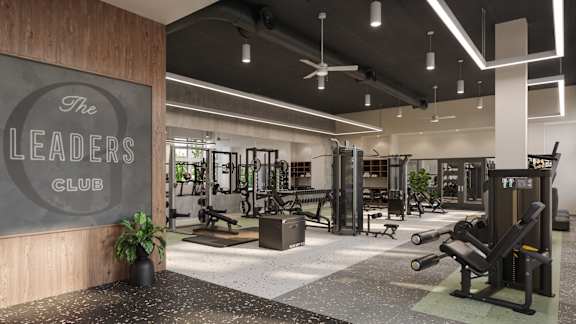 A gym with a sign that says "The Leaders Club".
