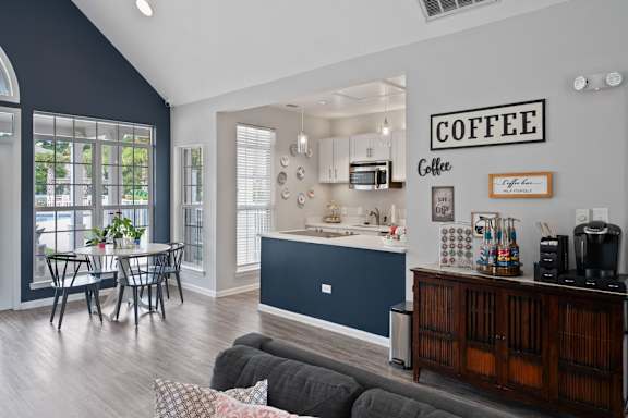A kitchen with a coffee sign on the wall at Litchfield Oaks Apartments in SC, 29585