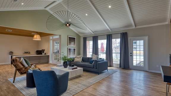 a living room with a coffered ceiling