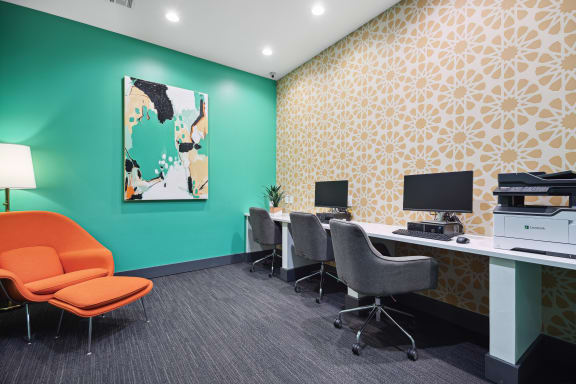 a office with a green wall and orange chairs and desks at Shellbrook, North Carolina
