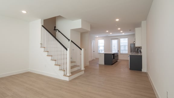 a view of the living room and staircase from the front of the house at Ainsworth, Richmond