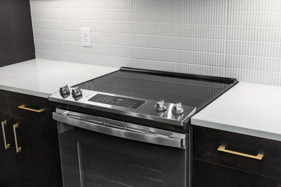an oven in a kitchen with a white counter top at Preston Centre, Columbus, OH