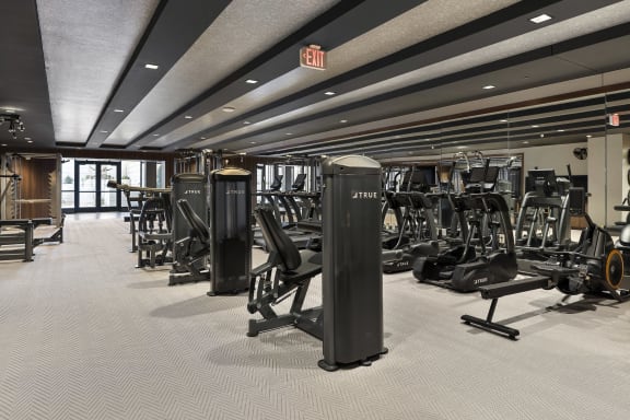 a gym with cardio machines and weights on the floorat Preston Centre, Ohio