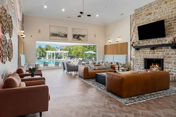 A living room with a fireplace and a couch.