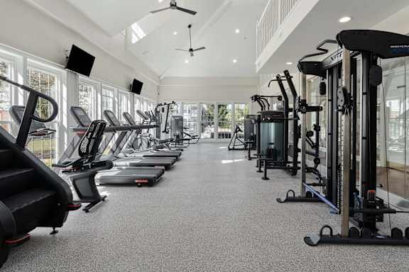 A spacious gym with a variety of cardio machines at The Orchard, Dublin, 43016