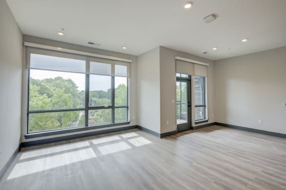 Bedroom With Expansive Windows at The Walker, Cary, NC