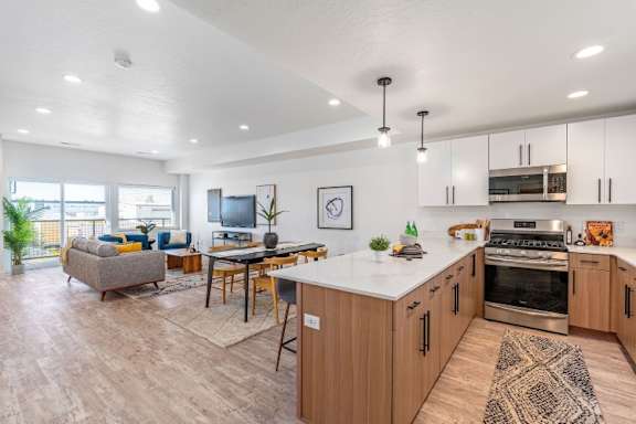open kitchen with a dining room and living room