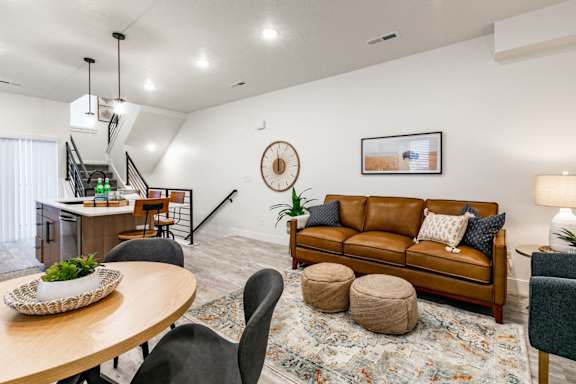 a living room with a couch and a table