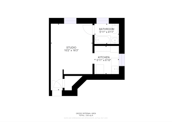 A floor plan of a studio apartment with a kitchen and bathroom.