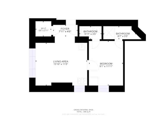 A floor plan of a home with a living area, two bathrooms, a foyer, and a W.C.