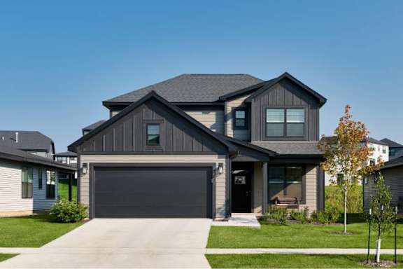 Floor Plan  a house with a black garage door