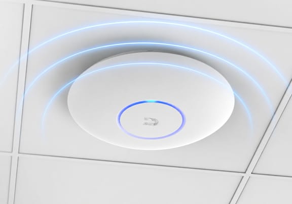 A smoke detector is mounted on the ceiling.