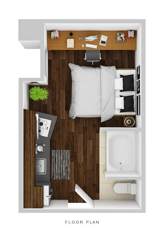 A floor plan of a small apartment with a bed, desk, and bathroom.