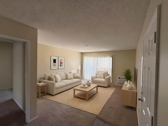 A living room with a couch, chair, and coffee table.