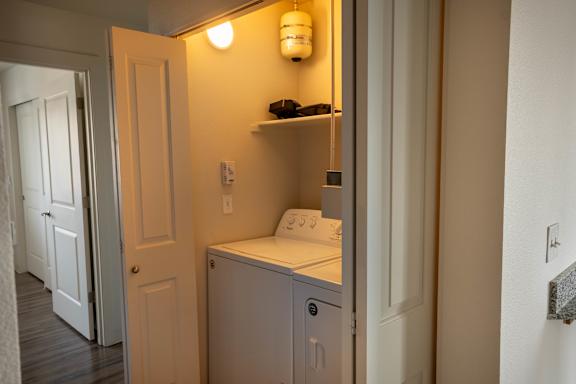 Small laundry room at St Helens Place Apartment Homes, St Helens