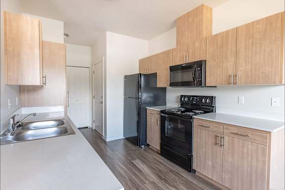 Kitchen with wooden cabinets at Silverplace Apartment Homes, Silverton, OR, 97381