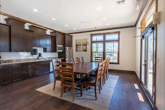 Kitchen with dark wood cabinets at Stoneplace Apartment Homes, Molalla, OR, 97038