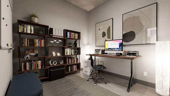 A room with a desk, chair, and bookshelf at Damask, Windsor, ON N8S 0B7