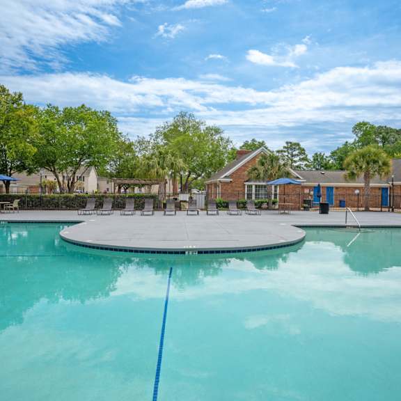 A swimming pool with a blue rope in the middle of it.