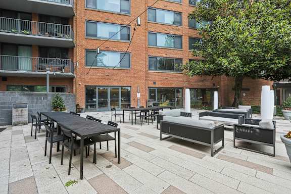 BBQ with seating area around at The Graham at Southern Towers, Alexandria, Virginia, 22311