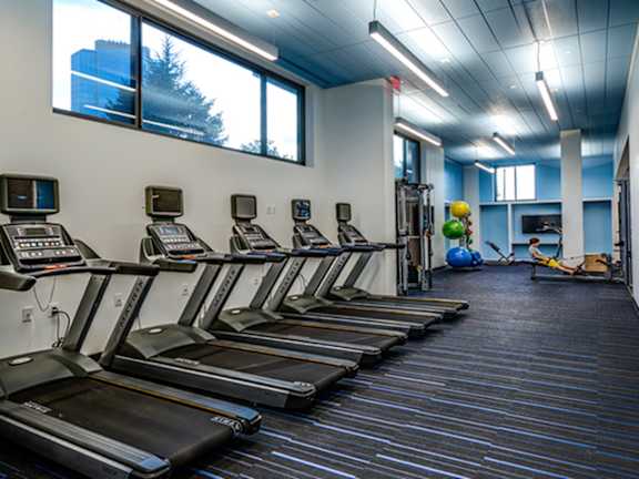 Gym with treadmills at The Graham at Southern Towers, Alexandria, VA, 22311