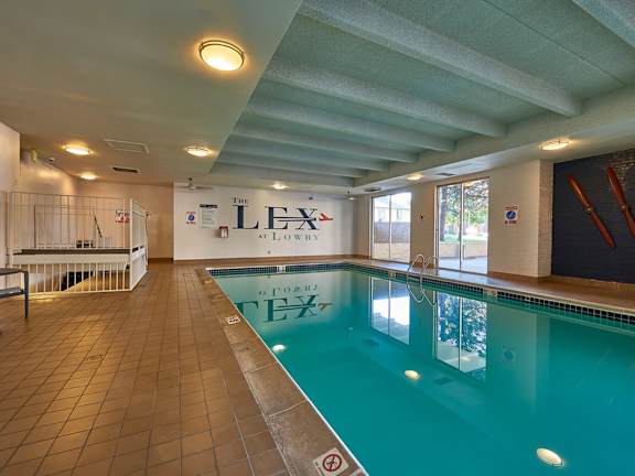 A large indoor swimming pool at The Lex At Lowry, Denver, 80224