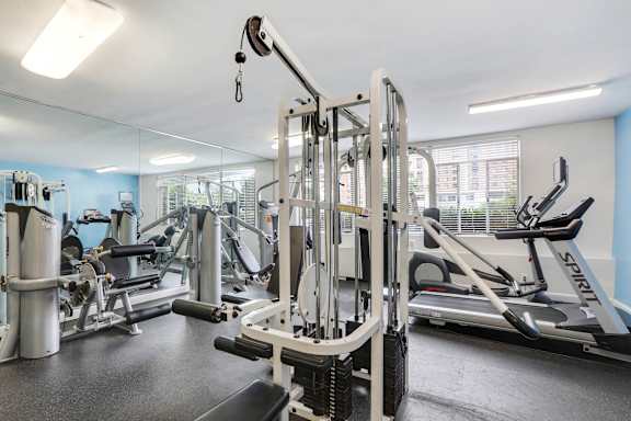Fitness center with weightlifting equipments  at Monticello at Southern Towers, Virginia