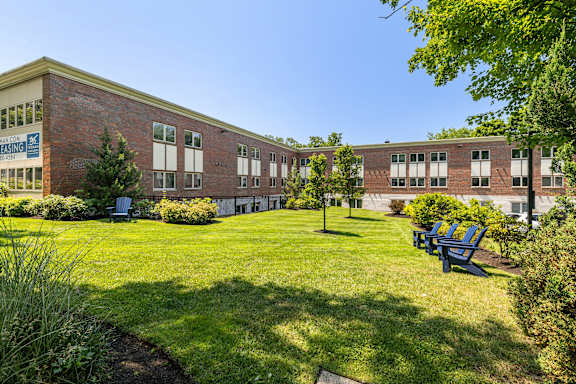Courtyard with Lush, Green Space and Outdoor Chairs at 735 Truman, Hyde Park