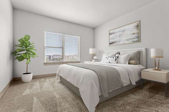 A bedroom with a bed, nightstand, and a plant.