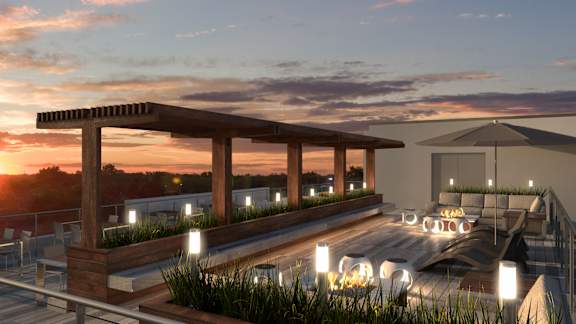 Rooftop terrace with pergola and sunset views at Kanata Lakes Apartments, Ottawa, ON