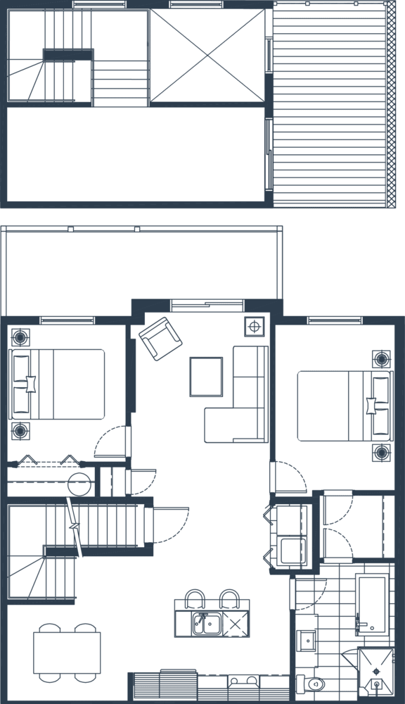 A floor plan of a house with a kitchen, living room, and two bedrooms.