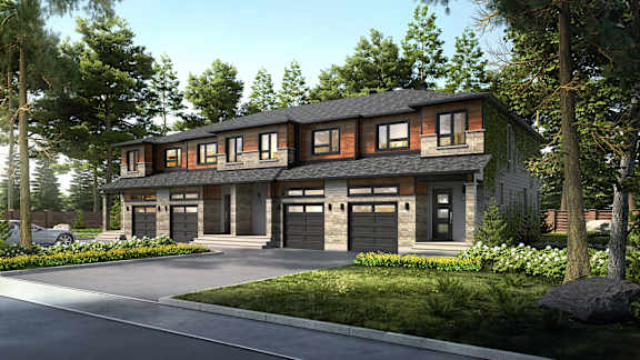 A modern house with a black roof and a garage is surrounded by trees and has a driveway in front.