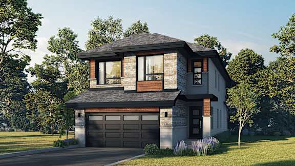 A modern house with a garage is surrounded by greenery.