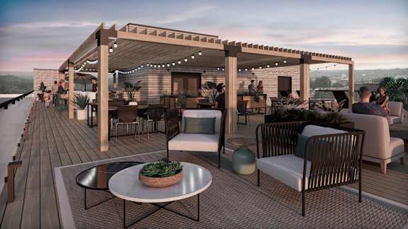 Rooftop lounge with pergola and modern furniture at Petries Landing II Apartments, Ottawa, ON K4A 0S8