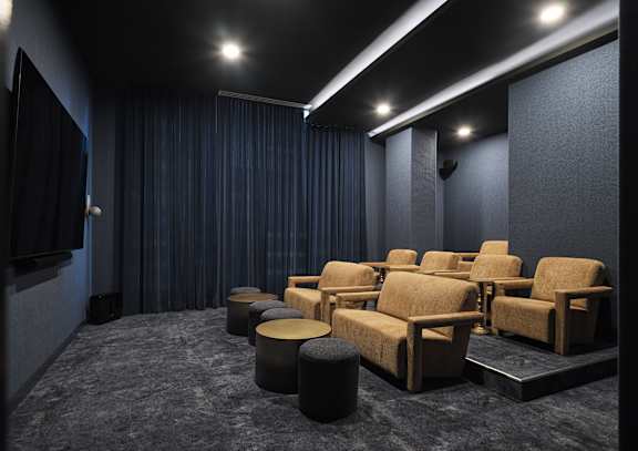 A dark room with a row of chairs and a screen on the wall at The Dale Apartments , Ottawa, Ontario