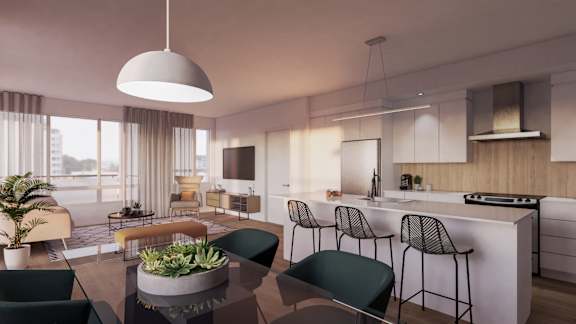 Open concept kitchen and living space with modern design at Petries Landing II Apartments, Ottawa, ON