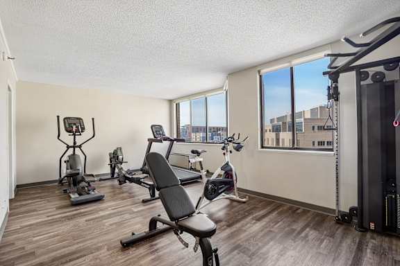 Fitness center with cardio and strength equipment at Irvine Park Towers