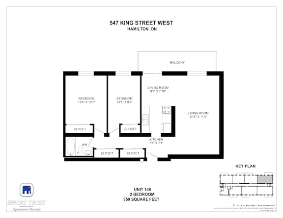 A floor plan for an apartment at 547 King Street West in Hamilton, Ontario, showing two bedrooms, a living room, a dining room, a kitchen, and a balcony.