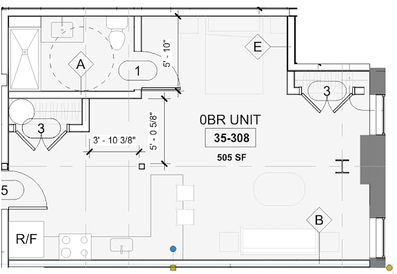 A floor plan of a 35-308 square foot unit with a kitchen, living room, and bathroom.