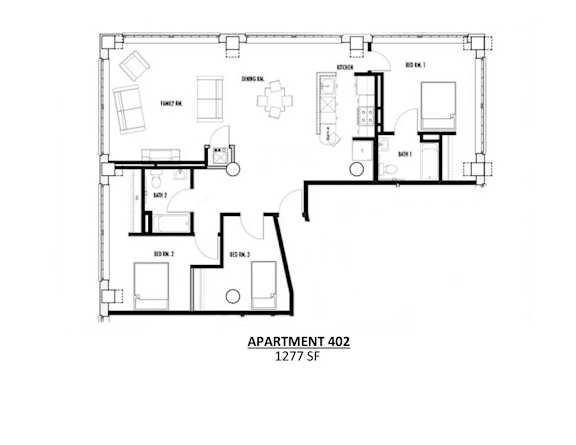 Apartment 402 is a 1277 square foot space with a living room, dining room, kitchen, and two bedrooms.