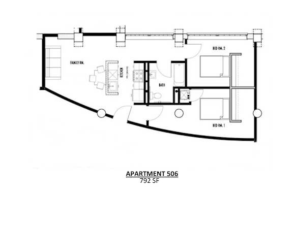 Apartment 506 is a 792 square foot space with a family room, kitchen, and two bedrooms.