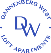 A logo with a blue 'DW' in a circle with text around it.