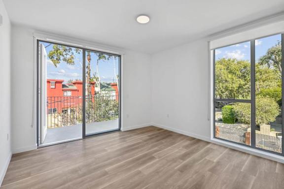 Glass Door Entry To Balcony at The Wilson, Santa Monica, 90405