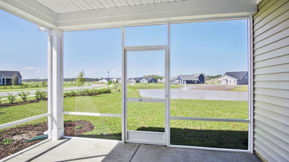A view from a house through a sliding glass door at Stepping Stone at Bridgewater Apartments, South Carolina