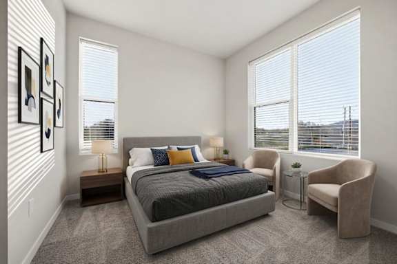 A bedroom with a large bed, a chair, and a window with blinds.