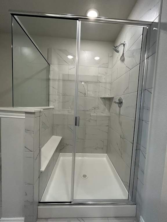 Walk in Shower with Glass Door at Cottages at Beltmill Apartments, Saginaw