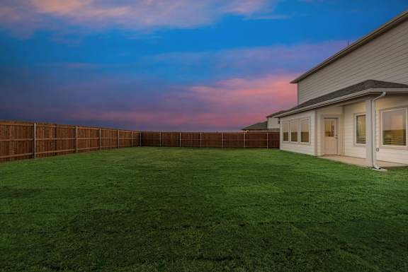 Large Backyard at Cottages at Beltmill Apartments, Saginaw, Texas