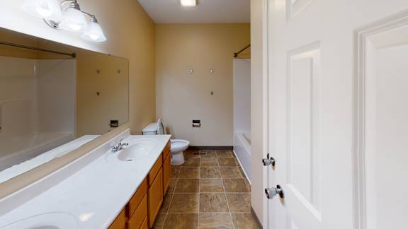 a bathroom with a sink and a toilet