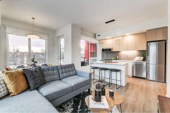 Living And Island Kitchen at Southpark on Whyte, Edmonton, AB